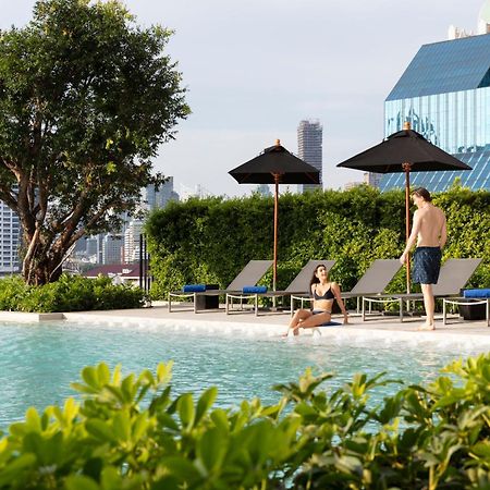 Отель Ascott Embassy Sathorn Бангкок Экстерьер фото The swimming pool at the hotel